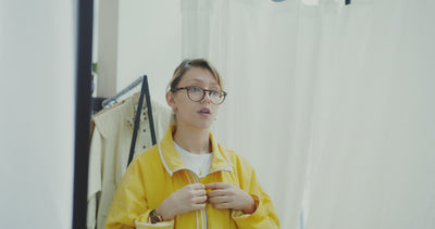 Averon fashion model wearing yellow jacket showcasing modern clothing collection and stylish outfits.